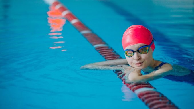 woman-professional-swimmer-swimming-pool_1303-24261