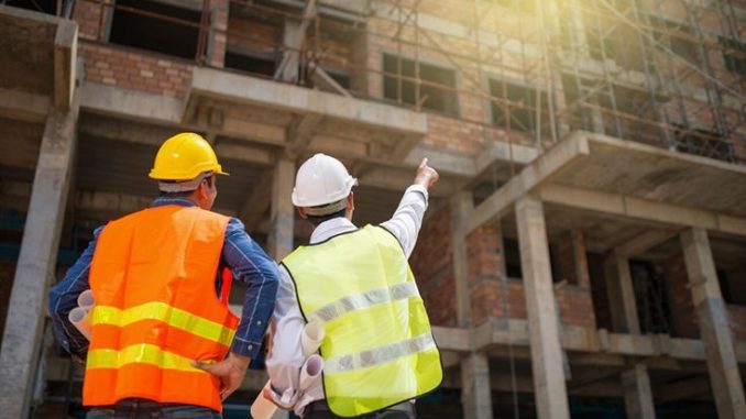 Construction,Engineers,Discussion,With,Architects,At,Construction,Site,Or,Building